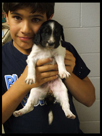 kid with puppy